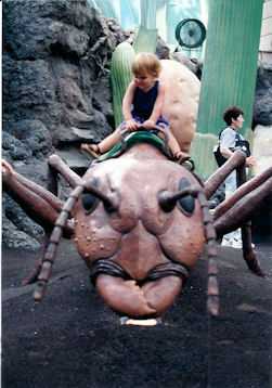 Max on oversized ant in 'Honey I Shrunk the Kids' area of MGM Studios.
