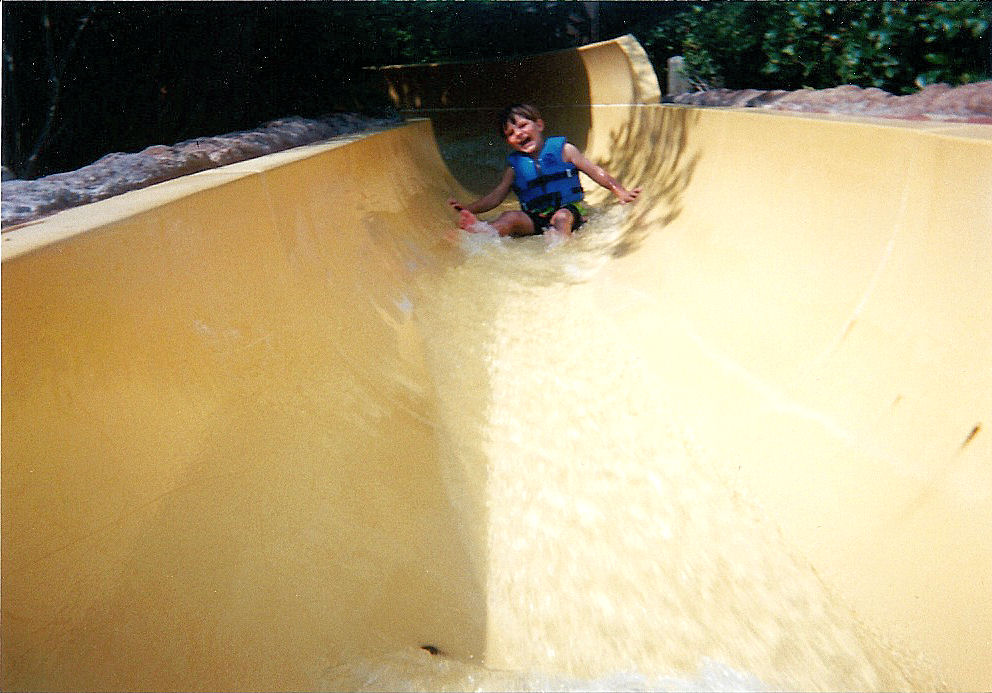 Me coming down a water slide in a Dixie Landings pool.
