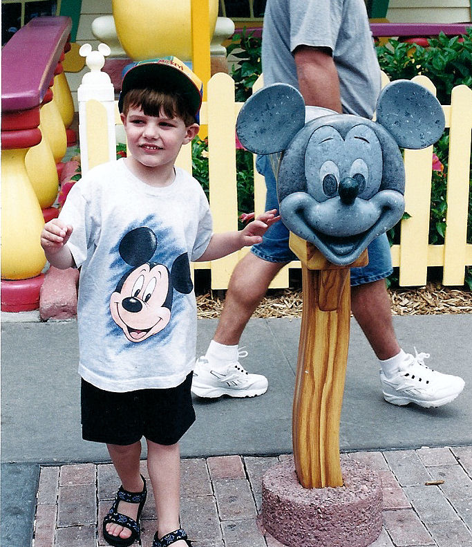 Me in front of Mickey's mailbox in Toontown Fair.