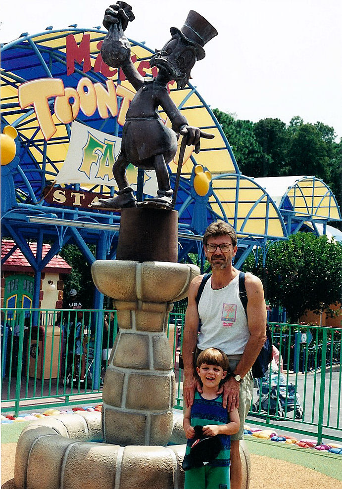 Dad and I in Mickey's Toontown Fair.