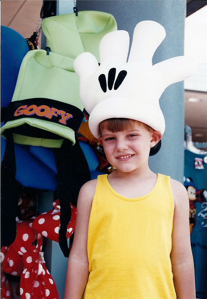 Me wearing a Mickey Mouse glove. Me wearing a Mickey Mouse glove.