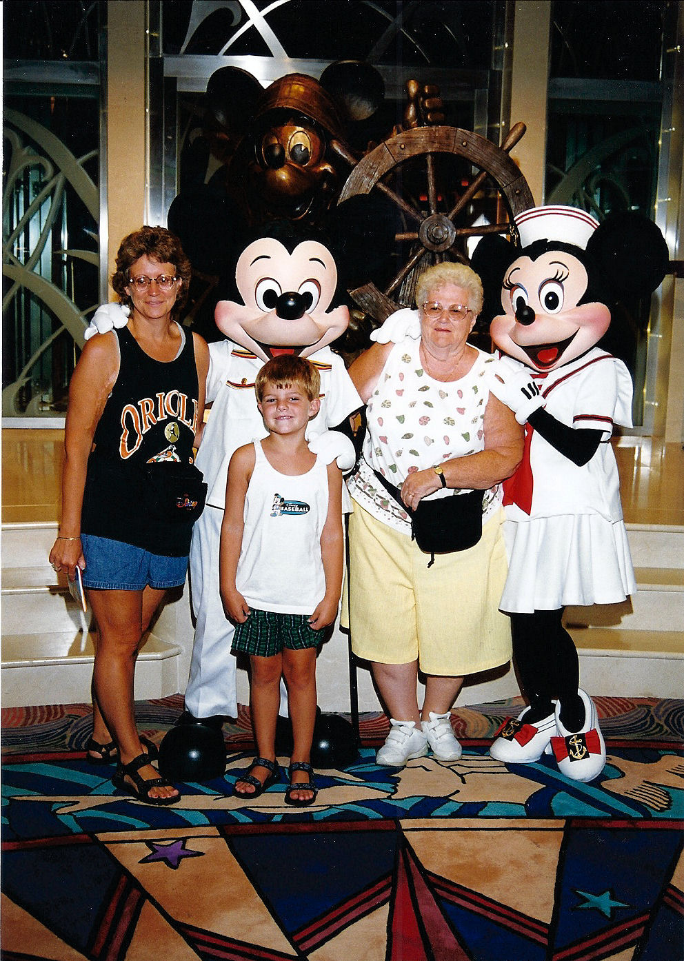 Me, my mother, and my grandmother with Mickey and Minnie on the Disney Cruise Line. Me, my mother, and my grandmother with Mickey and Minnie on the Disney Cruise Line.