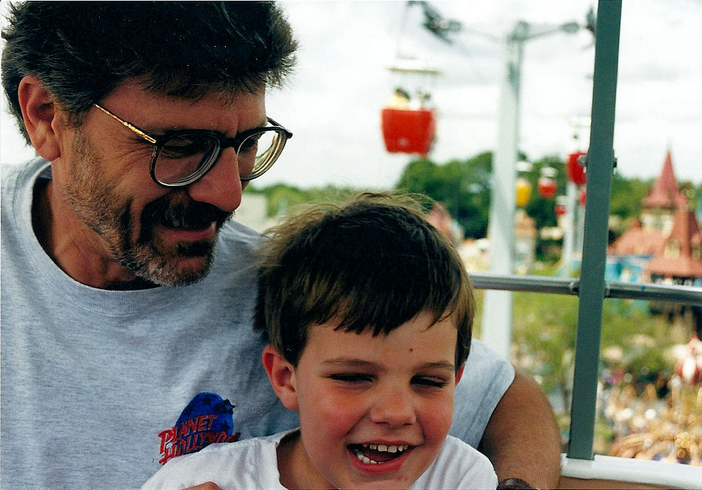 My dad and I on the skyway over The Magic Kingdom at Disney World. My dad and I on the skyway over The Magic Kingdom at Disney World.