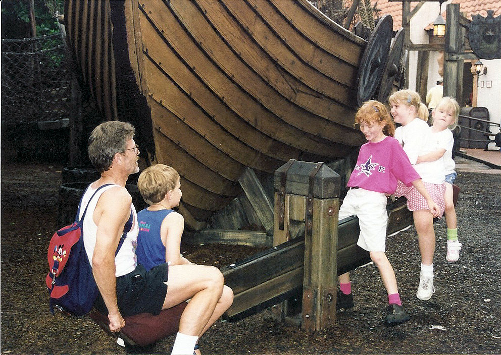 Dad and I on a seesaw in the Norway Pavilion at EPCOT.. Dad and I on a seesaw in the Norway Pavilion at EPCOT.