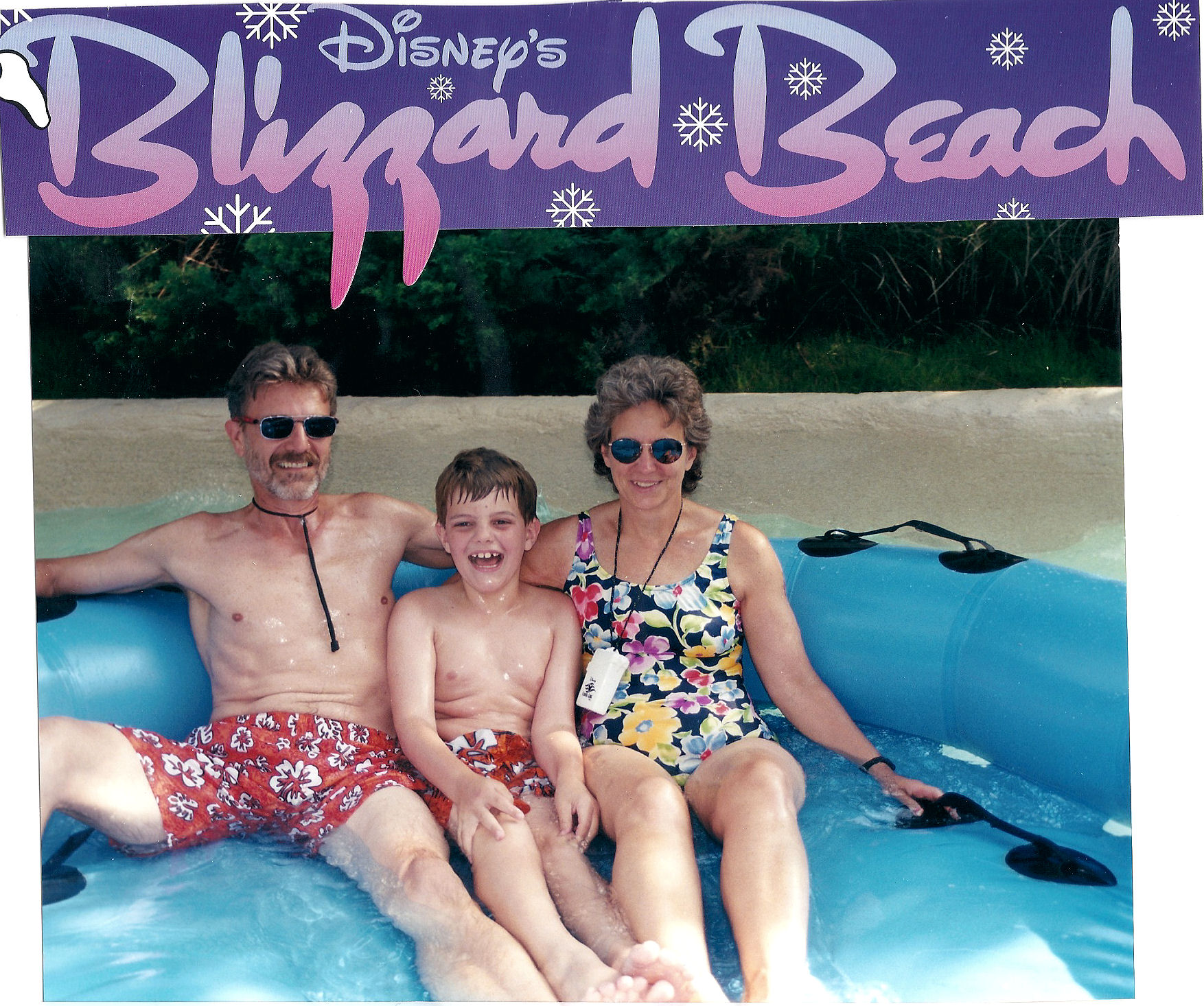 Me and my parents at Blizzard Beach, a water park at the Disney World Resort, just after riding the raft ride.