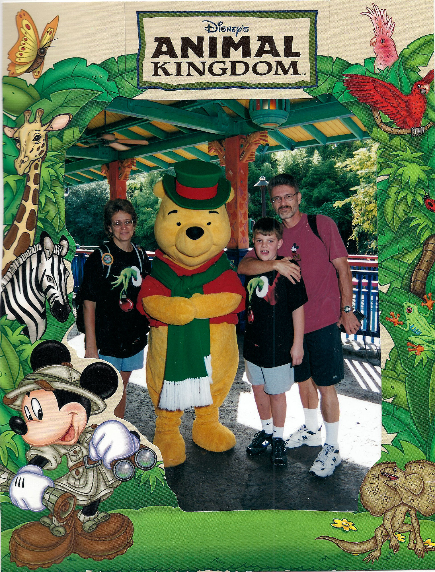 Me, my parents, and Pooh at Disney's Animal Kingdom, Disney World, around Christmas time.