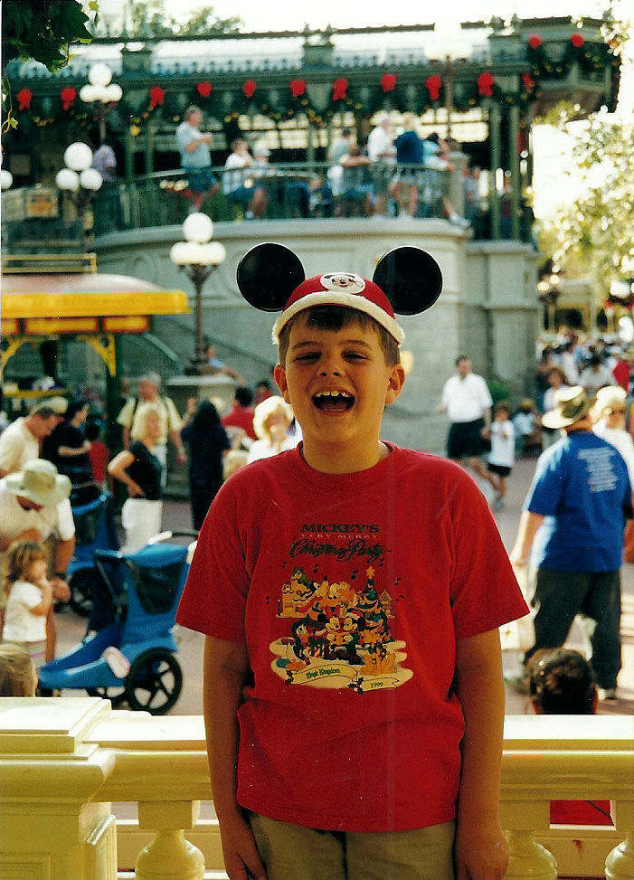 Me on Main Street U.S.A. at The Magic Kingdom, Disney World, around Christmas time.