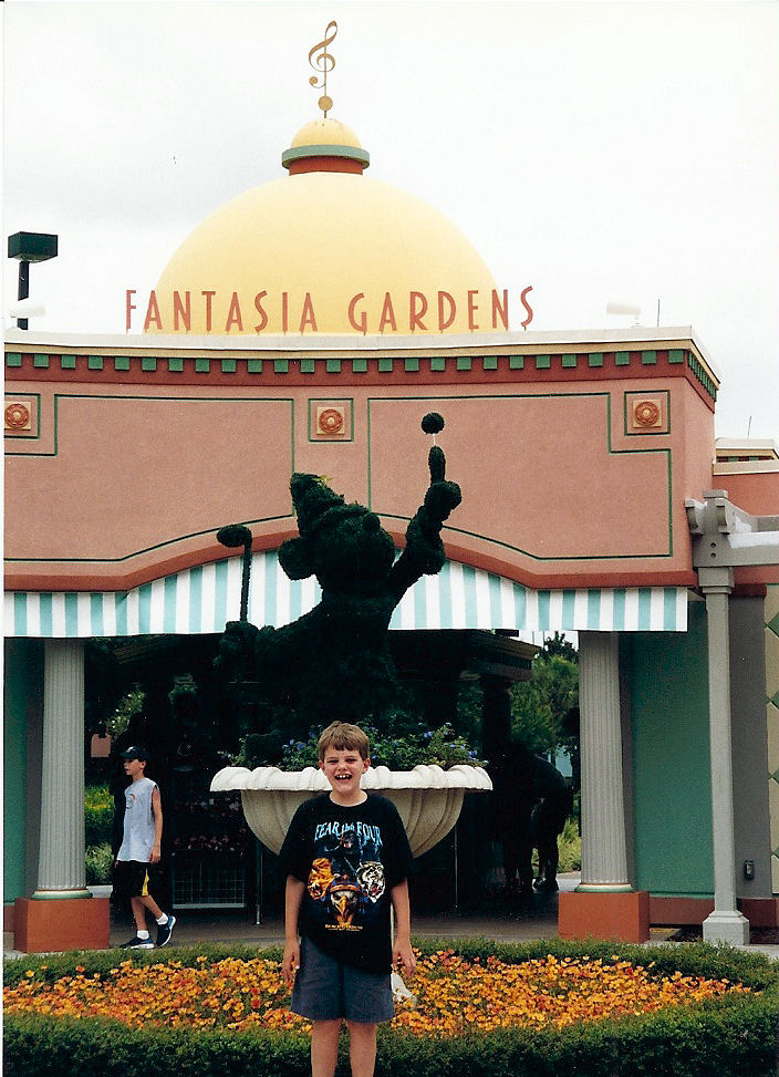 Me at the entrance to the Fantasia Gardens Miniature Golf course at the Walt Disney World Resort.