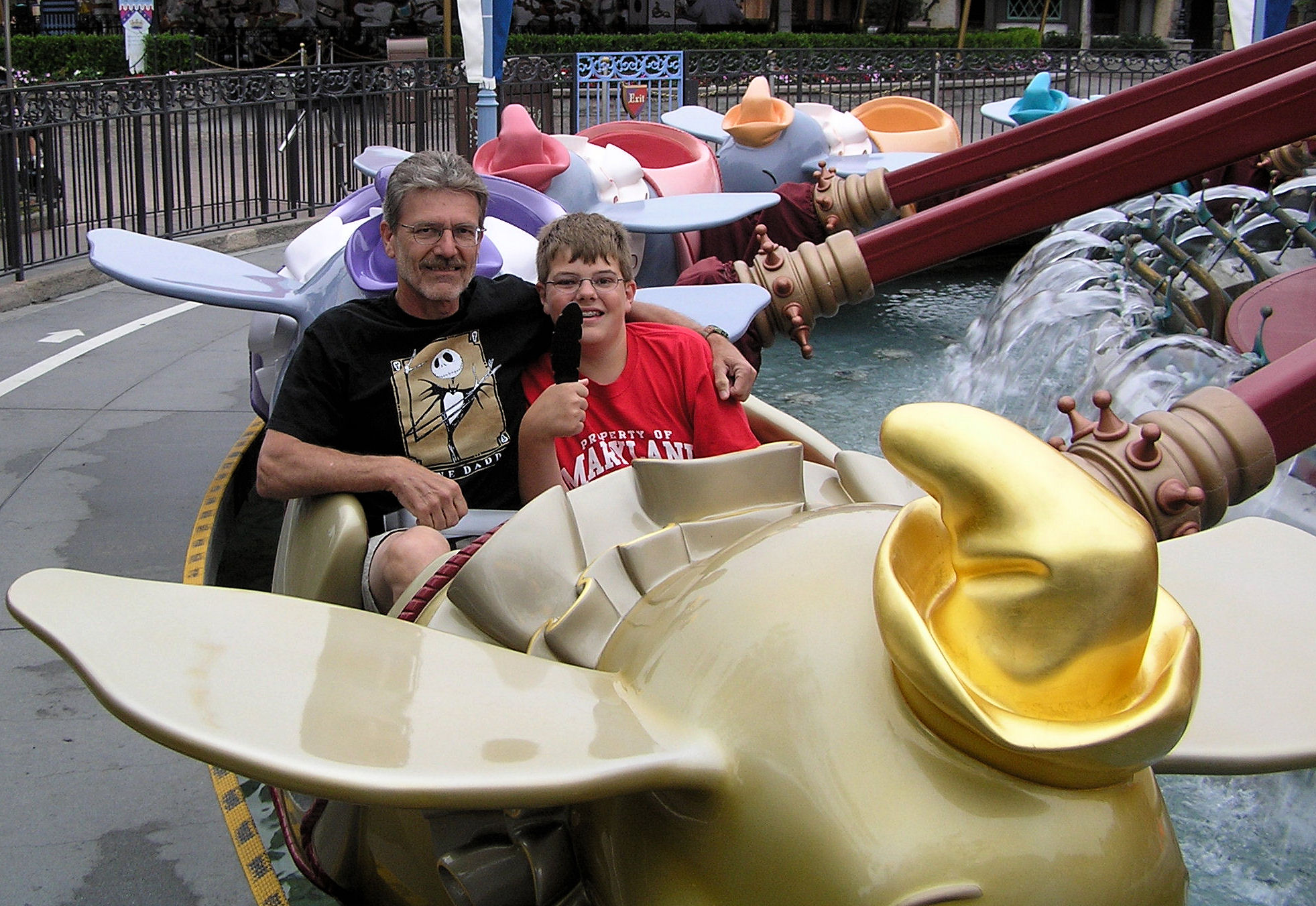 One of my favorite pictures ever, Dad and I in the golden Dumbo at Disneyland with the magic feather. (It was early in the morning and we were the only ones on the ride.)