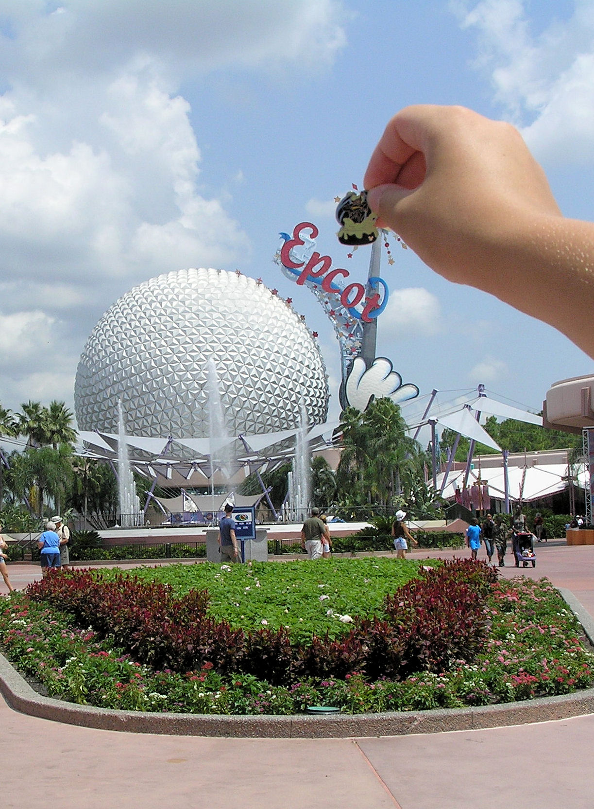 The Big Ball with the Mickey hand on it at EPCOT with me holding a pin in front of the top of the wand. The Big Ball with the Mickey hand on it at EPCOT with me holding a pin in front of the top of the wand.