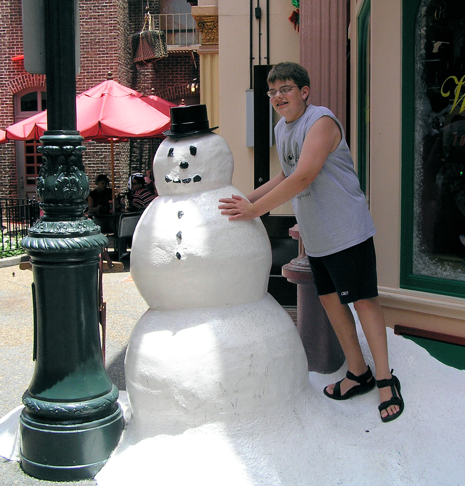That snowman must be melting because in relation to me he keeps getting shorter over the years. That snowman must be melting because in relation to me he keeps getting shorter over the years.
