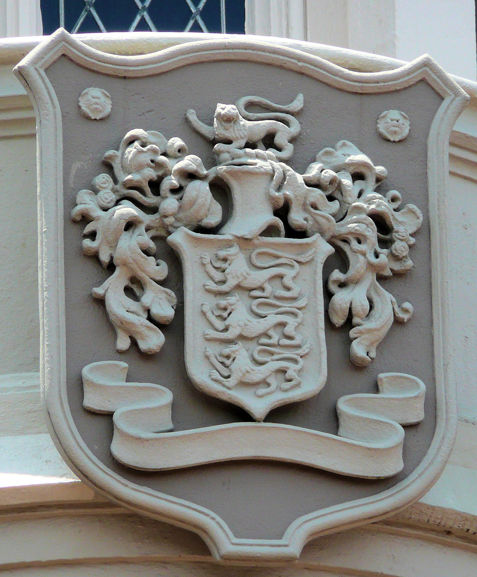 The Disney family crest on the Cinderella Castle at Magic Kingdom, Disney World. The Disney family crest on the Cinderella Castle at Magic Kingdom, Disney World.