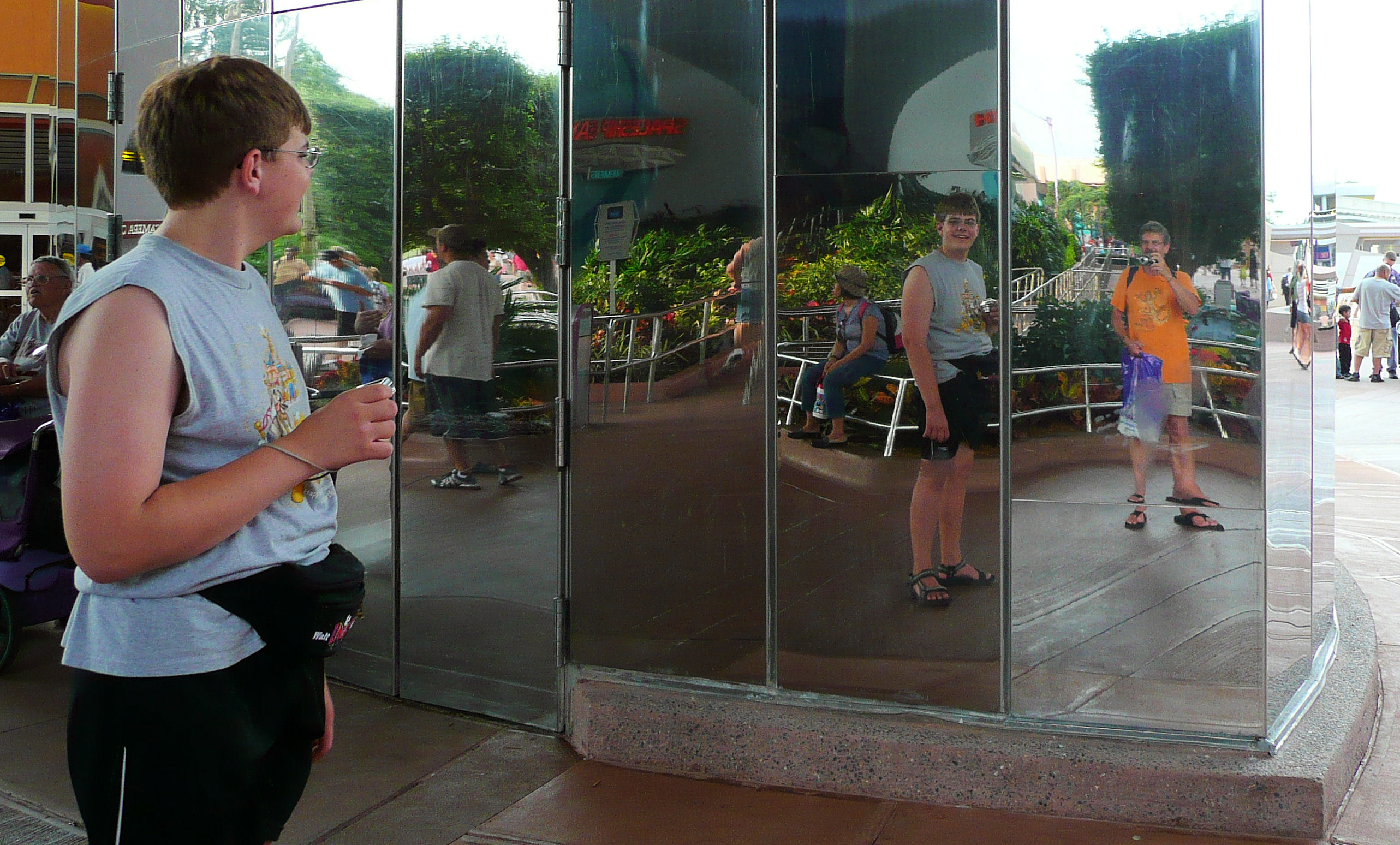 Me, myself, & Dad (in the orange shirt) underneath Spaceship Earth at EPCOT. Me, myself, & Dad (in the orange shirt) underneath Spaceship Earth at EPCOT.
