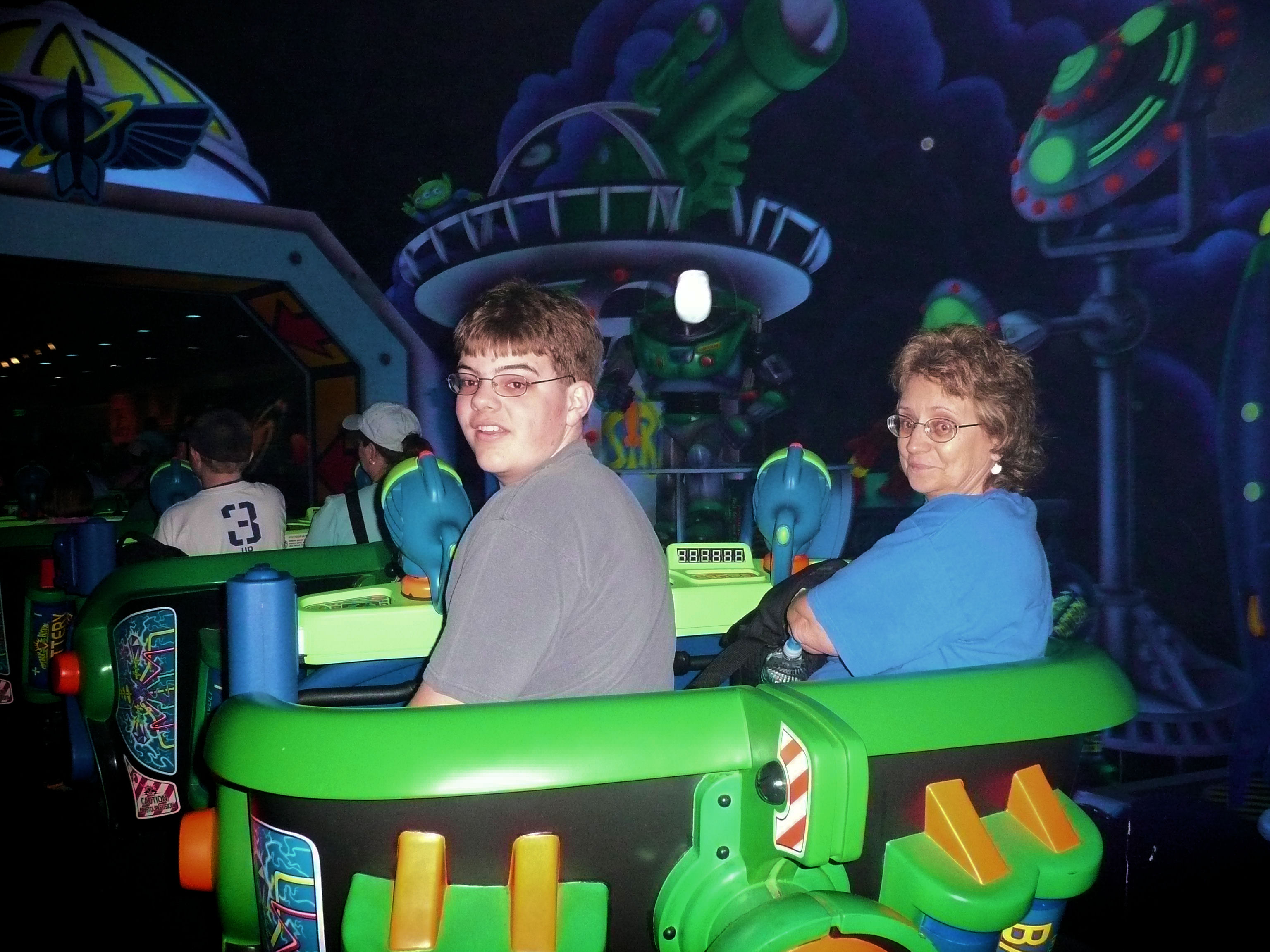 Mom and me on Buzz Lightyear's Space Ranger Spin at Disney World.