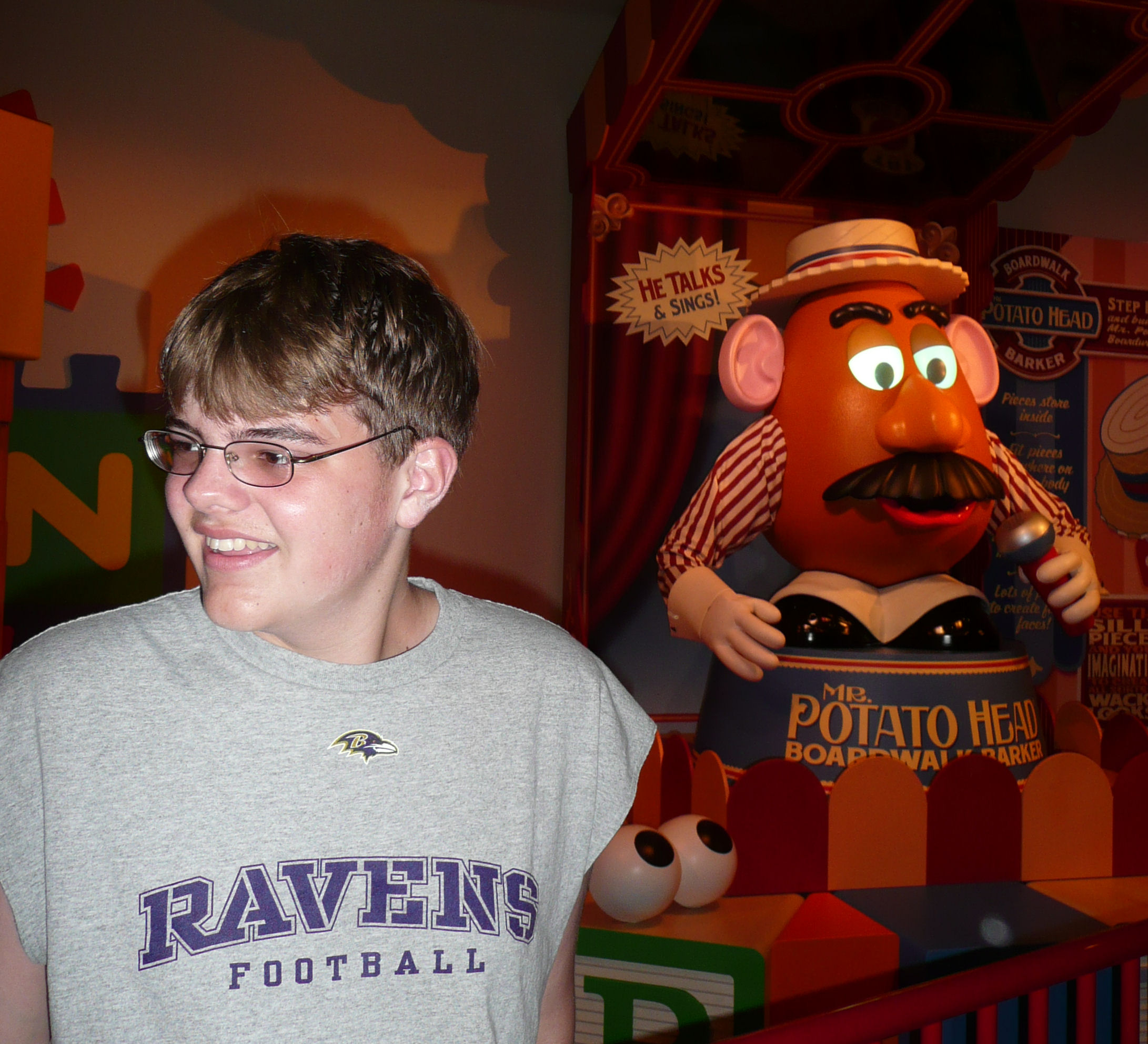 Inside the queue for Toy Story Midway Mania at Disney's Hollywood Studios; Mr. Potato Head (in the background) can take out his own ear and he talks to guests.