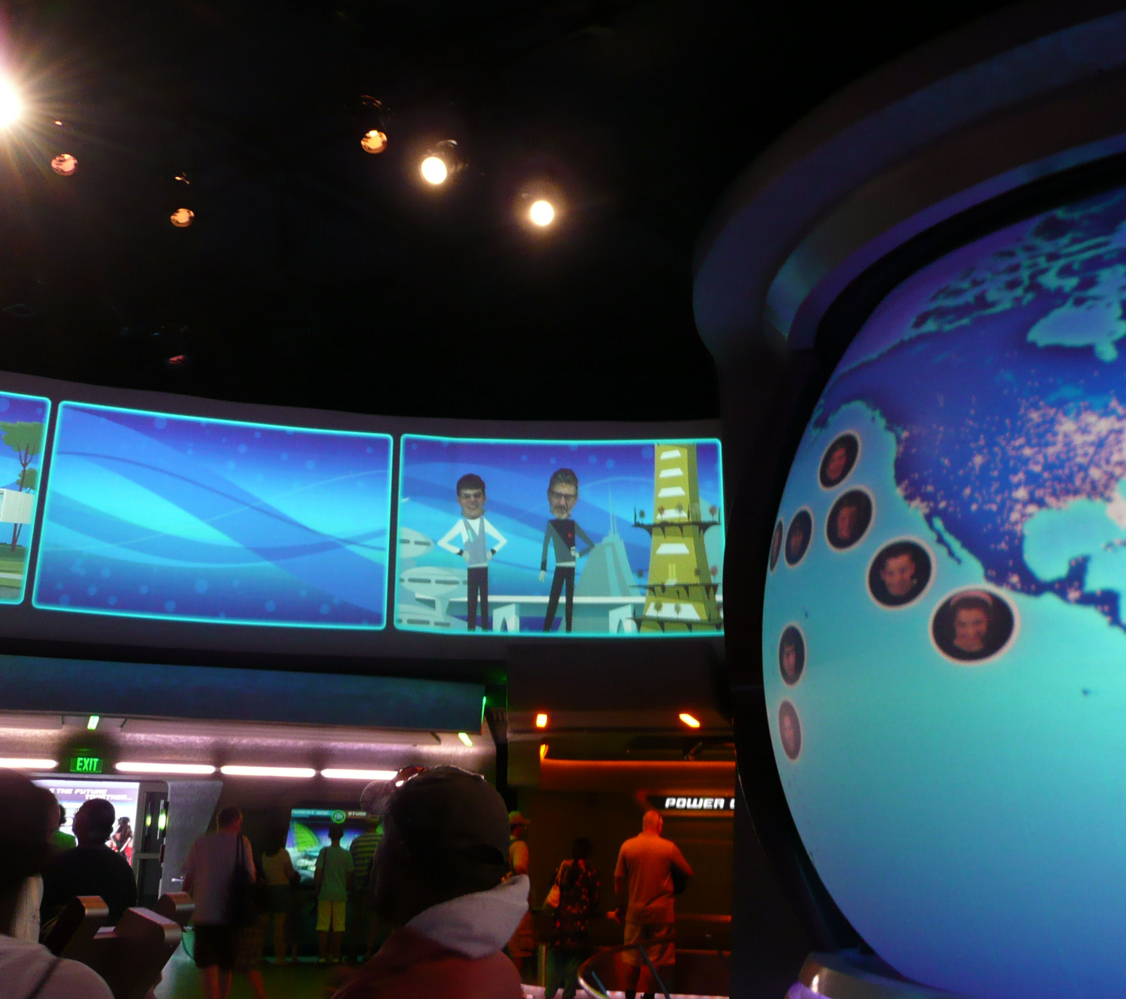 At the exit to Spaceship Earth, EPCOT; in the middle of the
picture you can see Dad and me up on the screen.