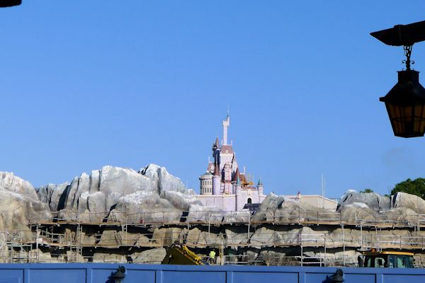 Peaking over the construction fence in Fantasyland.